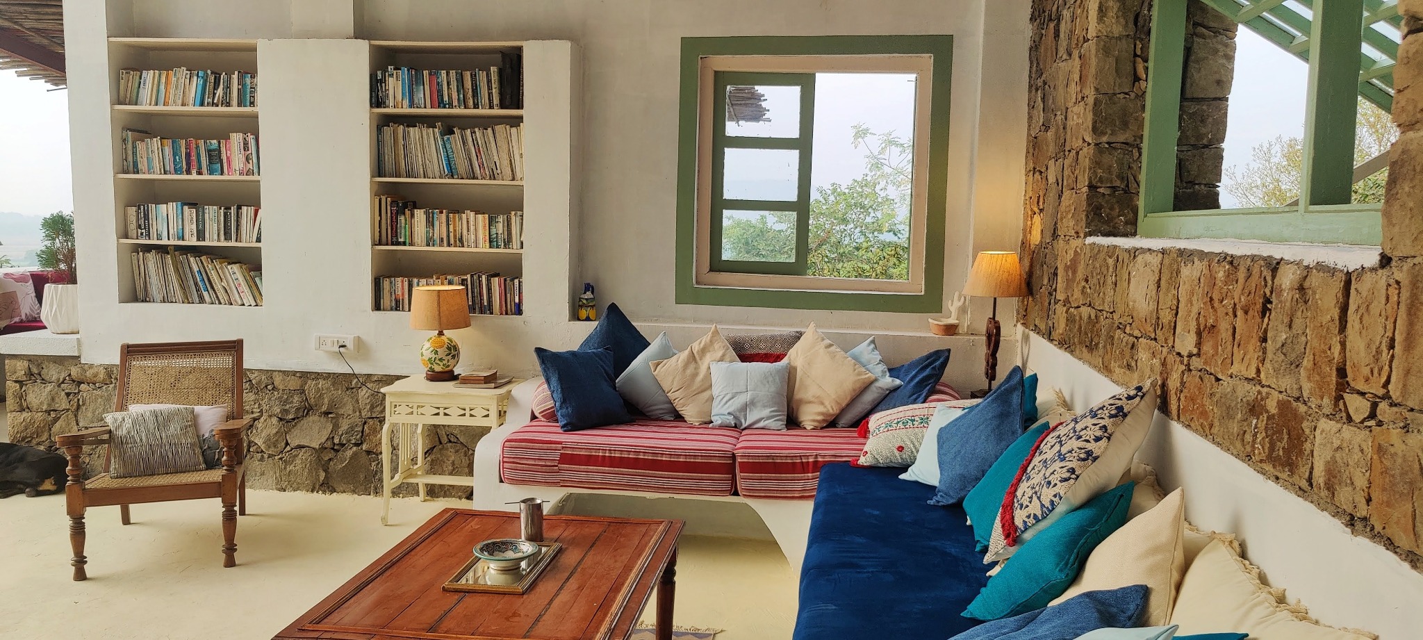 Firefly reading room with bookshelves and cushioned seating